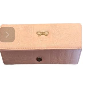 𝅺YADAS pink floral embossed Genuine Leather wallet shown with iPhone 7
